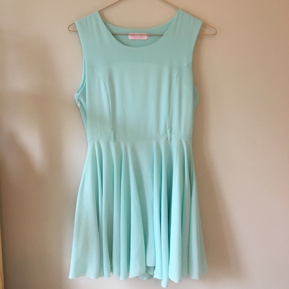 Dresses & Skirts - A cute blue mini flowy dress.